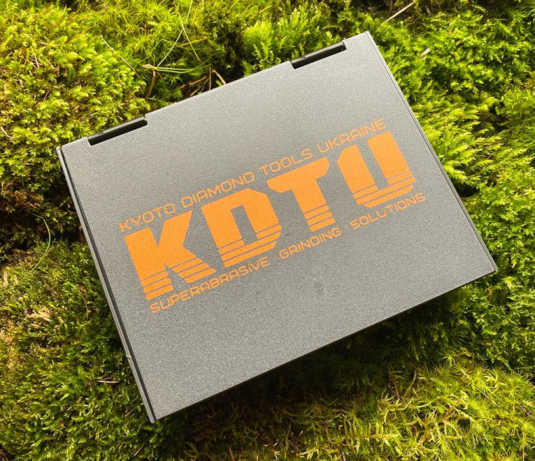 A plastic KDTU storage case for 10 stones
