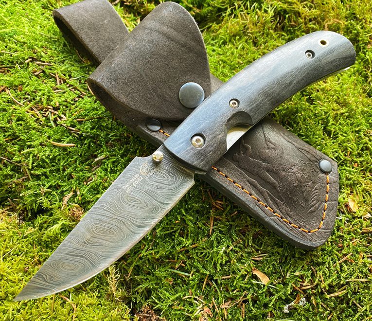 Damaskoksen teräksestä valmistettu taskuveitsi, taittoveitsi